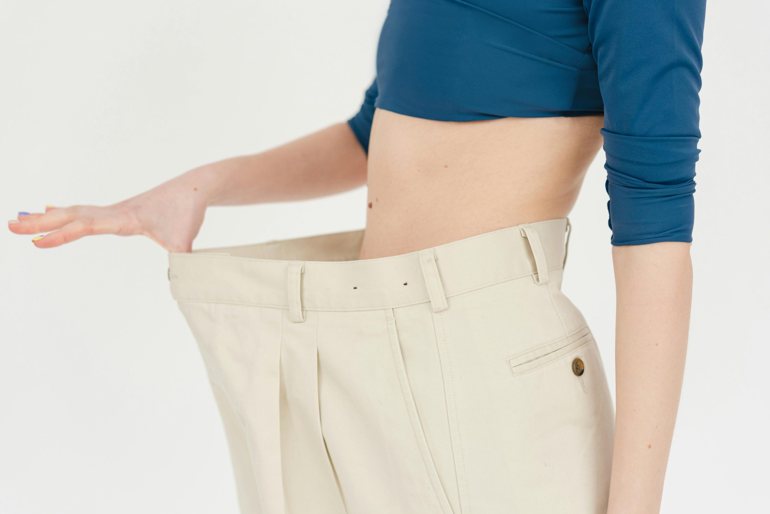 person holding waistband